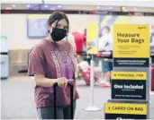  ??  ?? Jessica Aguilar and her sisters were stranded at Bradley Internatio­nal Airport last week after Spirit airlines canceled homebound flights to Denver.