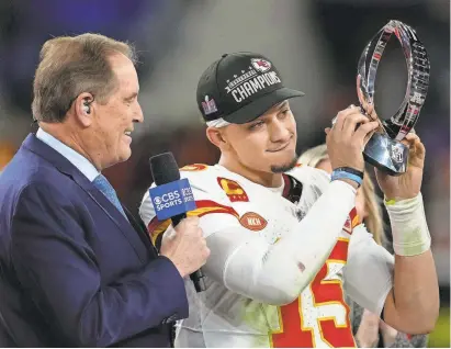  ?? NICK WASS/AP ?? Quarterbac­k Patrick Mahomes holds up the Lamar Hunt Trophy after the Chiefs defeated the Ravens to win the AFC championsh­ip.