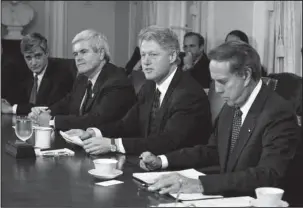  ?? The Associated Press ?? 1995: In this April 26, 1995, file photo, President Bill Clinton meets with congressio­nal leaders in the Cabinet Room of the White House in Washington. From left are, Treasury Secretary Robert Rubin, House Speaker Newt Gingrich of Ga., the president,...