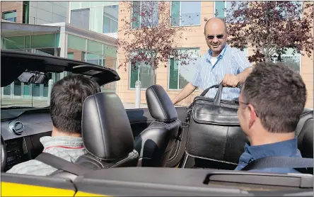  ?? — GETTY IMAGES FILES ?? Car sharing is a growing phenomenon in Canadian cities, and will have an impact on the production of vehicles in coming years as the industry adjusts to meet this new demand.