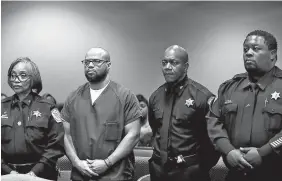  ?? AP PHOTOS/MARK WEBER ?? Surrounded by officers of the court, defendant Billy Ray Turner, second from left, makes an appearance in Judge Lee Coffee’s courtroom on Friday. Turner and co-defendant Sherra Wright are charged in the killing of former NBA player Lorenzen Wright.