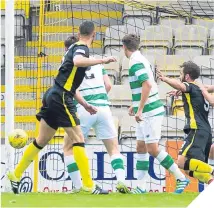  ??  ?? ■ Sean Crighton (left) scores Livingston’s third goal.