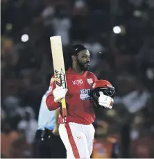  ?? AFP ?? Chris Gayle’s unbeaten hundred helped power Kings XI Punjab past Sunrisers Hyderabad on Thursday night at Mohali