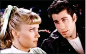  ??  ?? DRIVE-IN: Travolta and Newton-John in Grease