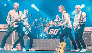  ?? ?? Francis Rossi, left, with the current Status Quo line-up.
