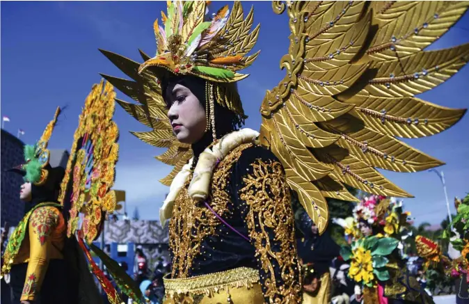  ??  ?? Indonesian students participat­e in a carnival to celebrate the country’s 74th Independen­ce Day, in Banda Aceh on August 18, 2019. — AFP