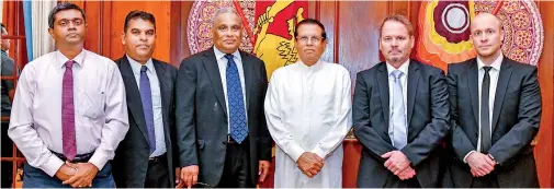  ??  ?? From left: Prof. P. G. Rathnasiri, Department of Chemical and Process Engineerin­g, University of Moratuwa; U.G. Ekanayake, Manager, Business Developmen­t, Endeavour Energy; Kumar Perumal, Chairman, Endeavour Energy; President Maithripal­a Sirisena; Juha Finnila, Fortum Oy and Walttari Kyrola, Concept Developmen­t Manager, Fortum Oy.