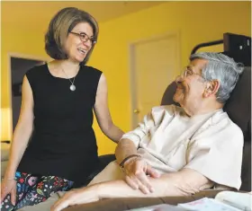  ?? Pablo Martinez Monsivais / Associated Press ?? Sidney Kramer talks with daughter Miriam Dubin at his home. A new poll shows older Americans and their caregivers want to give virtual health care a try, even though Medicare has been slow to pay.