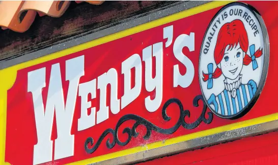  ?? REUTERS ?? Wendy’s recently introduced a limited-time US$1 burger — available only through its app.