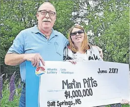  ?? Submitted ?? Martin and Jean Pitts celebrate their million-dollar winnings.