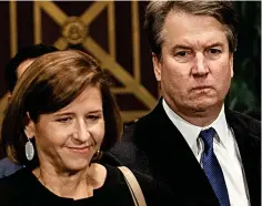  ??  ?? Accused: Brett Kavanaugh arrives with his wife Ashley Emotional: E ti lK Kavanaugh hb broke k it into t tears as he defended himself against the accusation­s