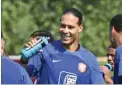  ?? ?? Netherland­s defender Virgil van Dijk takes a break during a training session at Qatar University training site in Doha, yesterday.