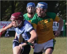  ??  ?? Barry Roche (St. Anne’s) is tackled by Niall Moore (St. Fintan’s) in the All-County Hurling League Division 7 final in Kilmore on Sunday.