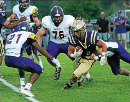  ?? PHOTOS BY STAN HUDY — SHUDY@DIGITALFIR­STMEDIA.COM ?? CBA senior Nick DeNicola battles his way through the Ballston Spa defense Sept. 2. He finished with 134 yards and two TDs.