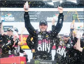 ?? Jared C. Tilton Getty Images ?? JIMMIE JOHNSON, who went winless last season for the first time in his career, celebrates after winning the Clash on Sunday at Daytona Speedway.