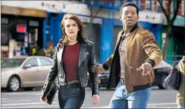  ?? Jonathan Wenk CBS ?? “GOD FRIENDED ME”: Brandon Micheal Hall, with Violett Beane, plays a podcast host who questions his own beliefs after a brush with the Almighty.