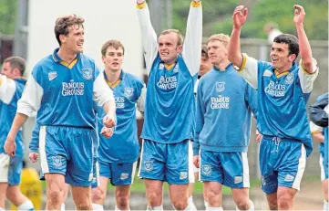  ??  ?? Davidson, far right, with team-mates after Saints won the first division in 1997.