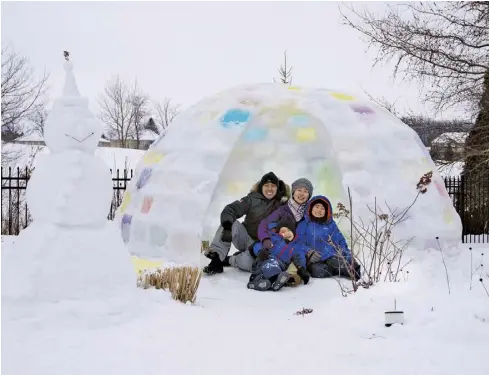  ?? Submitted ?? The Ma family spent three weeks building a colourful ice igloo in their backyard during the pandemic lockdowns.