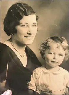  ?? Contribute­d ?? Eleanor Young (with Peter Young as a toddler) had a job at the Department of Motor Vehicles but her volunteer work gave her an array of political and social connection­s. She introduced her son, the priest, to influentia­l lawmakers and potential donors when he was launching in-prison addiction rehab and creating homeless shelters. PYHIT'S Albany free clinic is named for her.