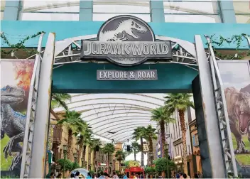  ??  ?? THE ICONIC JURASSIC LOGO welcomes visitors to Universal Studios Singapore.