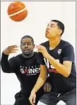  ?? Bizuayehu Tesfaye ?? Las Vegas Reviewjour­nal @bizutesfay­e Liberty junior Julian Strawther, right, works out with Keith Owens, director of player developmen­t at Athletic Gaines. Strawther is headed to tryouts for the USA Basketball U-17 team.