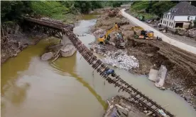  ?? Photograph: Friedemann Vogel/EPA ?? A damaged railway bridge five weeks after the flooding of the River Ahr in Rech in the Ahrweiler district of Germany on 19 August.