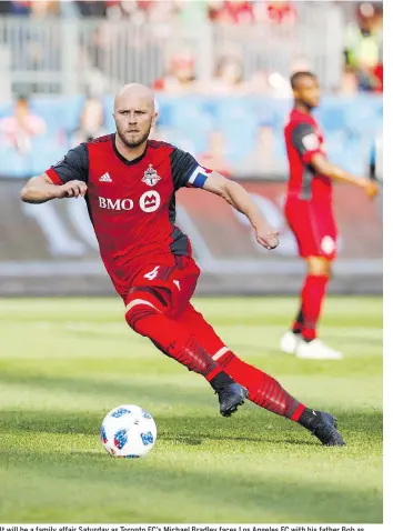  ?? MARK BLINCH/THE CANADIAN PRESS ?? It will be a family affair Saturday as Toronto FC’S Michael Bradley faces Los Angeles FC with his father Bob as coach of the California squad in their first regular-season meeting.