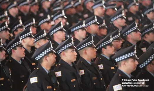  ?? GETTY IMAGES ?? A Chicago Police Department graduation ceremony at Navy Pier in 2017.