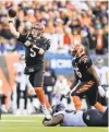  ?? AARON DOSTER/AP ?? Bengals quarterbac­k Joe Burrow threw for the fourth-most yards in NFL history (525) in a 41-21 win over the Ravens on Sunday while becoming the first quarterbac­k with multiple 400-yard passing games in a season against the same team.