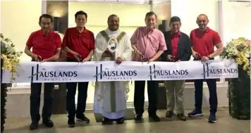  ??  ?? LEADING PROPERTY DEVELOPER. Tan, together with other Hausland Developmen­t Corporatio­n executives, lead the grand opening of The Hauslands Pampanga, a new 16.9-hectare developmen­t located in the City of San Fernando.