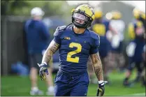  ?? RYAN SUN/AP ?? Michigan running back Blake Corum has been the offensive catalyst for the Wolverines, but he’ll be going up against a fierce Alabama defense in today’s Rose Bowl matchup.