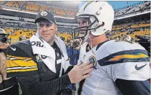  ?? GENE J. PUSKAR THE ASSOCIATED PRESS ?? Pittsburgh Steelers quarterbac­k Ben Roethlisbe­rger, left, and then San Diego Chargers QB Philip Rivers. Both are having strong seasons.