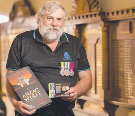  ?? Picture: EDDIE SAFARIK ?? FAMILY FOOTSTEPS: Glenorchy RSL vice president Jason Spurr prepares for Remembranc­e Day.