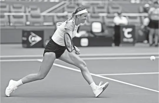  ?? BURKE/USA TODAY SPORTS GEOFF ?? Victoria Azarenka hits a forehand against Yulia Putintseva (not pictured) during the Miami Open on Tuesday at Hard Rock Stadium in Miami Gardens, Fla.