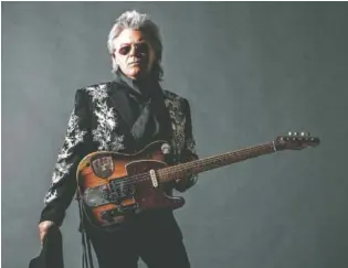  ?? PHOTO BY ALYSSA GAFKJEN ?? Marty Stuart and his all-star band, the Fabulous Superlativ­es, stop in Walker Theatre on Saturday night for a show supporting their new album, “Way Out West.”