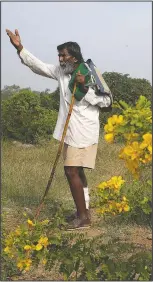  ??  ?? Kamegowda points towards one of the ponds he created.