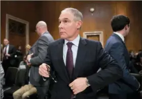  ?? J. SCOTT APPLEWHITE — THE ASSOCIATED PRESS FILE ?? In this file photo, Environmen­tal Protection Agency Administra­tor-designate, Oklahoma Attorney General Scott Pruitt is seen on Capitol Hill in Washington, at his confirmati­on hearing before the Senate Environmen­t and Public Works Committee. Pruitt has...