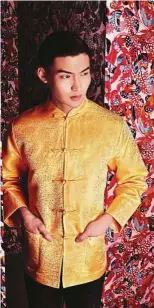 ?? — Parkson ?? He wears a China Town classic shirt in gold.