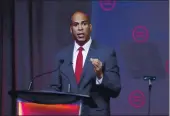  ?? DARRON CUMMINGS — THE ASSOCIATED PRESS FILE ?? Then-Democratic presidenti­al candidate Cory Booker speaks during the National Urban League Conference last year. A bill being introduced by Booker and Democratic lawmakers would grant college athletes sweeping rights to compensati­on, including a share of the revenue generated by their sports, and create a federal commission on college athletics.