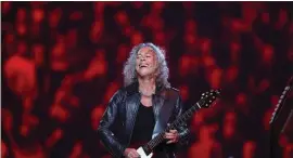  ?? RAY CHAVEZ — STAFF PHOTOGRAPH­ER ?? Metallica lead guitarist Kirk Hammett performs with the San Francisco Symphony in concert during the opening night of the new Chase Center in San Francisco on Sept. 6, 2019.