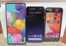  ?? JEFFERSON GRAHAM ?? From left, Samsung’s Galaxy A51, Google Pixel 4A and Apple iPhone SE