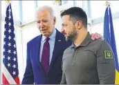  ?? Susan Walsh Associated Press ?? PRESIDENT BIDEN with Ukrainian President Volodymyr Zelensky in Hiroshima, Japan, on Sunday.