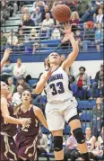  ?? Photo by Steven Eckhoff ?? Armuchee’s Rebekah Hammond goes up for a shot against Dade County.