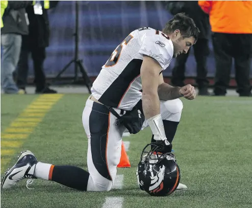  ?? JIM ROGASH / GETTY IMAGES / AFP FILES ?? During the 2011 season, former Broncos quarterbac­k Tim Tebow was well known for kneeling on the football field — although it was for the centuries- old purpose of reverence during prayer, Rex Murphy writes.