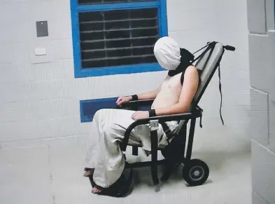  ?? AUSTRALIAN BROADCASTI­NG CORPORATIO­N / AFP / GETTY IMAGES ?? Australian Prime Minister Malcolm Turnbull says he was “appalled” by videos from the Australian Broadcasti­ng Corporatio­n’s Four Corners program, which include inmate Dylan Voller hooded and bound to a restraint chair.