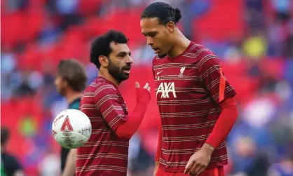  ?? Photograph: Alex Livesey/Danehouse/Getty Images ?? Mohamed Salah (left) was substitute­d during the FA Cup final following a groin problem while Virgil van Dijk also came off after a knee injury.