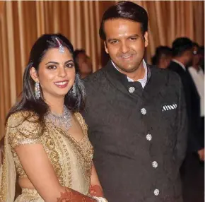  ??  ?? Reliance Industries heiress Isha Amabani-Piramal with husband Piramal Group heir Anand Piramal
