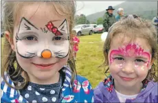  ??  ?? Heather and Grace MacDougal had their faces painted.