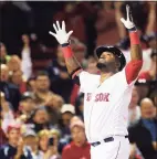  ?? Maddie Meyer / Getty Images ?? The Red Sox’s David Ortiz celebrates after hitting a home run against the Yankees during a 2016 game in Boston.