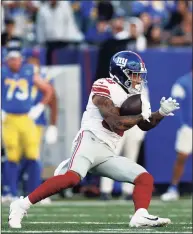  ?? Adam Hunger / Associated Press ?? New York Giants tight end Evan Engram runs against the Los Angeles Rams during Sunday’s game in East Rutherford, N.J.